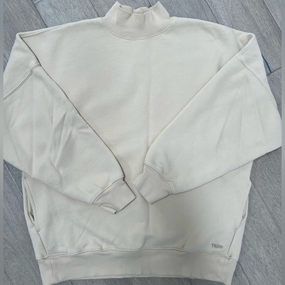 Aritzia TNA Cozy Fleece Sweatshirt in Cream